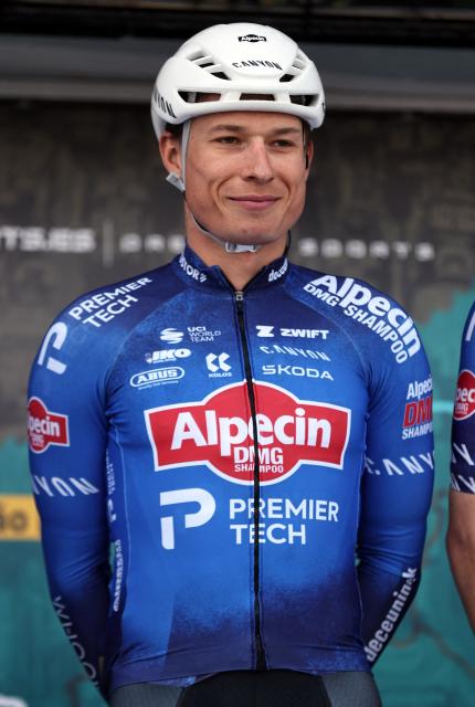 UCI WorldTeam Alpecin–Deceuninck Belgian rider Jasper Philipsen is pictured during the team presentation, ahead of the first stage of the 52nd edition of the Volta ao Algarve, a 183.5 km race between Vila Real de Santo Antonio and Tavira on February 18, 2026. (Photo by Joгo Matos / AFP)