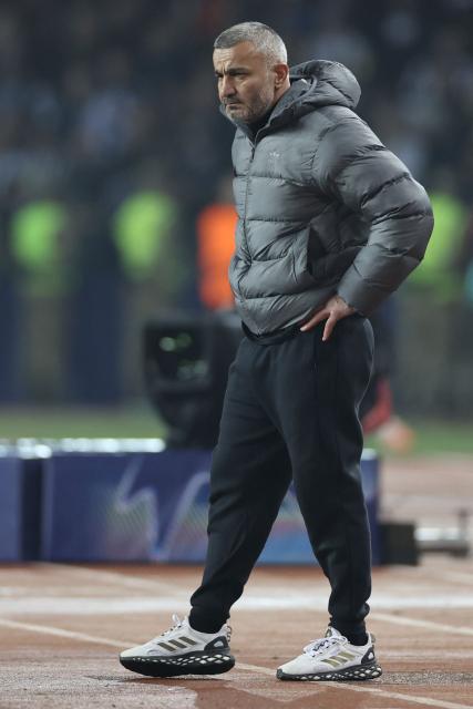 Qarabag's Azerbaijan coach Gurban Gurbanov is seen on the sideline during the UEFA Champions League knockout phase play-off first leg football match between Qarabag and Newcastle at the Tofiq Bahramov Republican Stadium in Baku on February 18, 2026. (Photo by Giorgi ARJEVANIDZE / AFP)