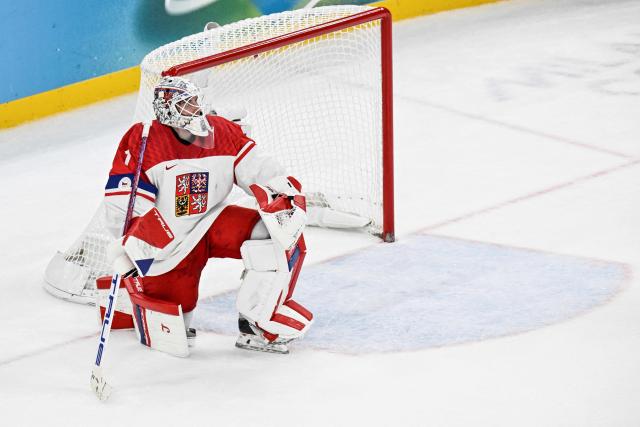 Czech Republic's goalkeeper #01 Lukas Dostal reacts at the end of the men's play-off quarter-final ice hockey match between Canada and Czech Republic at the Milano Santagiulia Ice Hockey Arena during the Milano Cortina 2026 Winter Olympic Games in Milan, on February 18, 2026. Canada wins 4 - 3 against Czech Republic and is qualified for the semi-finals. (Photo by Alexander NEMENOV / AFP)