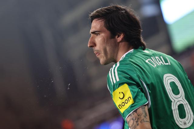 Newcastle United's Italian midfielder #08 Sandro Tonali spits during the UEFA Champions League knockout phase play-off first leg football match between Qarabag and Newcastle at the Tofiq Bahramov Republican Stadium in Baku on February 18, 2026. (Photo by Giorgi ARJEVANIDZE / AFP)