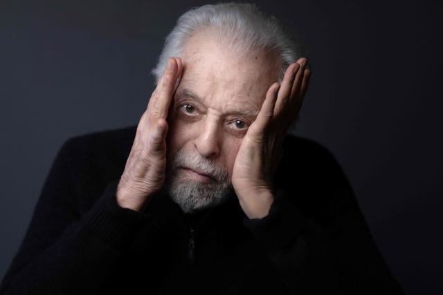 Chilean-French filmmaker, playwright, actor, author, musician and comics writer Alejandro Jodorowsky poses during a photo session at his home in Paris on February 16, 2026. (Photo by JOEL SAGET / AFP)