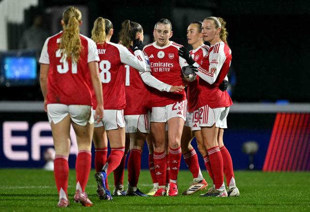 Arsenal's English striker #23 Alessia Russo (3R) celebrates scoring the team's first goal during the UEFA Women's Champions League knockout stage football match between Arsenal and Oud-Heverlee Leuven at Meadow Park in Borehamwood, north of London on February 18, 2026. (Photo by Glyn KIRK / AFP)