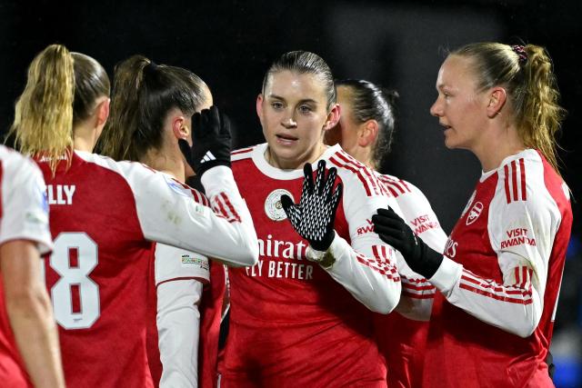 Arsenal's English striker #23 Alessia Russo (C) celebrates scoring the team's first goal during the UEFA Women's Champions League knockout stage football match between Arsenal and Oud-Heverlee Leuven at Meadow Park in Borehamwood, north of London on February 18, 2026. (Photo by Glyn KIRK / AFP)