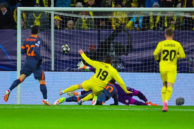 Bodo/Glimt's Norwegian midfielder #19 Sondre Brunstad Fet (C) scores the opening goal during the UEFA Champions League first-leg, play-off football match  Bodo/Glimt vs Inter Milan at Aspmyra statium in Bodo, Norway on February 18, 2026. (Photo by Thomas Andersen / NTB / AFP) / Norway OUT
