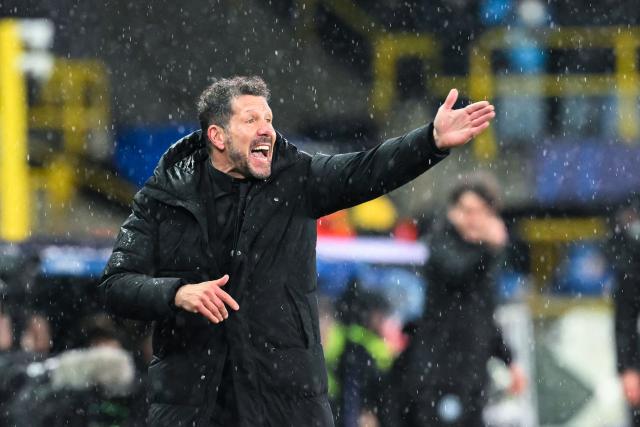 Atletico Madrid's Argentine coach Diego Simeone gestures during the UEFA Champions League knockout round play-off first leg football match between Club Brugge and Atletico Madrid at the Jan Breydel Stadium in Brugge on February 18, 2026. (Photo by NICOLAS TUCAT / AFP)