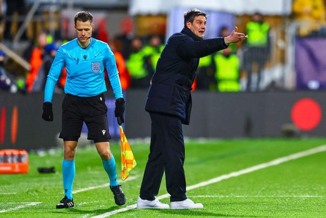 Inter Milan's Romanian head coach Cristian Chivu reacts from the sidelines during the UEFA Champions League first-leg, play-off football match  Bodo/Glimt vs Inter Milan at Aspmyra statium in Bodo, Norway on February 18, 2026. (Photo by Mats Torbergsen / NTB / AFP) / Norway OUT