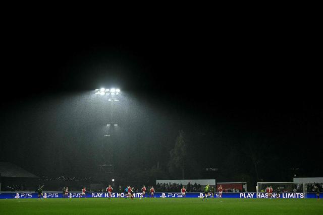 Rain falls during the UEFA Women's Champions League knockout stage football match between Arsenal and Oud-Heverlee Leuven at Meadow Park in Borehamwood, north of London on February 18, 2026. (Photo by Glyn KIRK / AFP)