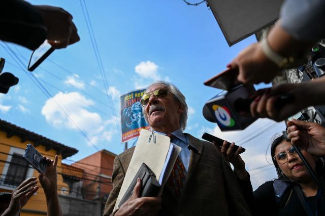 Guatemalan journalist and founder of the former newspaper El Periodico, Jose Ruben Zamora speaks with media before presenting a memorandum at the headquarters of the Registry of Legal Entities of the Ministry of the Interior in Guatemala City on February 18,2026. The renowned Guatemalan journalist Jose Ruben Zamora, under house arrest, requested on February 18, 2026, the dissolution of a far-right foundation that he accuses of “criminalizing” and “persecuting” colleagues and human rights defenders. (Photo by JOHAN ORDONEZ / AFP)