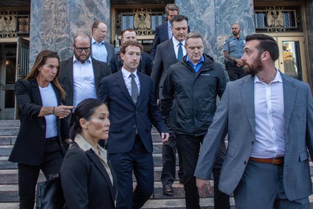 Meta CEO and Chairman Mark Zuckerberg (C) leaves the Los Angeles Superior Court after testifying in the social media trial tasked to determine whether social media giants deliberately designed their platforms to be addictive to children, in Los Angeles, on February 18, 2026. (Photo by Apu GOMES / AFP)