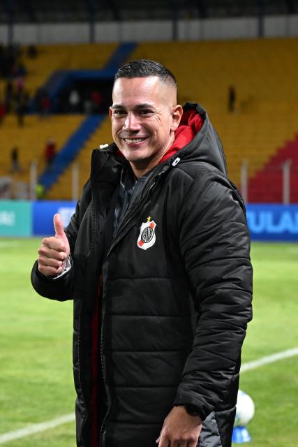 Nacional Potosi's head coach Leonardo Eguez gestures during the Copa Libertadores phase two first-leg football match between Bolivia's Nacional Potosi and Brasil's Botafogo at the Victor Agustin Ugarte Stadium in Potosi, Bolivia, on February 18, 2026. (Photo by Aizar RALDES / AFP)