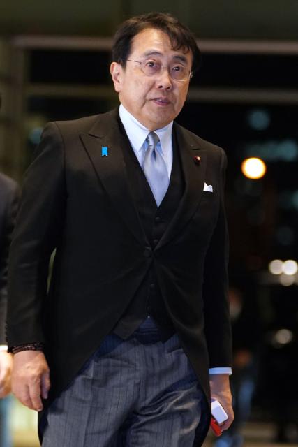 This photo taken on February 18, 2026 shows Ryosei Akazawa who was reappointed as Minister of Economy, Trade and Industry in the Cabinet of Prime Minister Sanae Takaichi, at the Prime Minister's Office in Tokyo. (Photo by Kazuhiro NOGI / AFP)