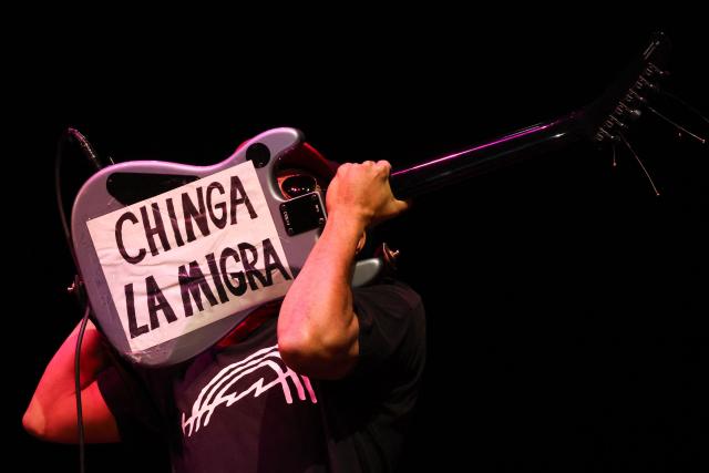 US guitarist and political activist Tom Morello, formerly of Rage Against the Machine band, performs during the campaign kickoff for the California Billionaire Tax Act promoted by US Senator Bernie Sanders at The Wiltern in Los Angeles, February 18, 2026. Sanders is seeking the support of California voters for a November's ballot initiative of an emergency tax on billionaires to help the state's healthcare system. (Photo by Patrick T. Fallon / AFP)