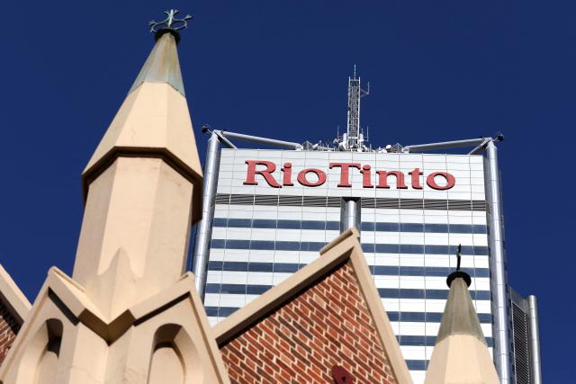 (FILES) This picture taken on September 3, 2025, shows the logo of Rio Tinto, a global mining and metals company, at the headquarters in Perth, Western Australia. Mining giant Rio Tinto's net profit fell in 2025 as costs climbed and it took a hit from a slump in the Chinese economy, company results showed on February 19, 2026. (Photo by Antony DICKSON / AFP)