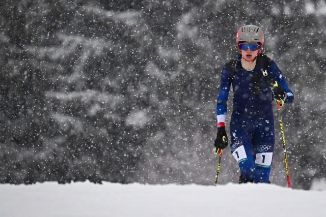 France's Emily Harrop competes in the women's sprint ski mountaineering heat 1 during the Milano Cortina 2026 Winter Olympic Games at the Stelvio Ski Centre in Bormio (Valtellina) on February 19, 2026. (Photo by Fabrice COFFRINI / AFP)