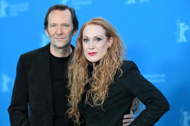 Austrian director and cinematographer Rainer Frimmel (L) and Italian screenwriter and director Tizza Covi pose during a photo call for the film "The Loneliest Man in Town" presented in competition at the 76th Berlinale, Europe's first major film festival of the year, in Berlin on February 19, 2026. (Photo by RALF HIRSCHBERGER / AFP)