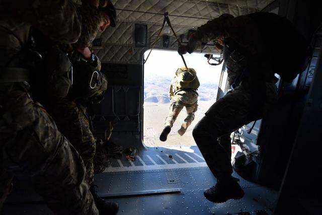 Kyrgyz paratroopers undergo parachute descending drills near the Ala-Too military grounds, some 20km from the capital Bishkek, on February 19, 2026. (Photo by Vyacheslav OSELEDKO / AFP)