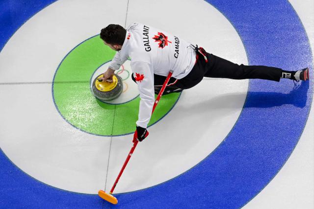 Canada's Brett Gallant competes in the curling men's round robin between Norway and Canada during the Milano Cortina 2026 Winter Olympic Games at the Cortina Curling Olympic Stadium in Cortina d’Ampezzo on February 19, 2026. (Photo by Wikus de WET / AFP)