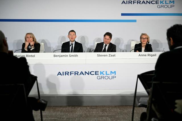 (L-R) KLM president and Chief Executive Officer Marjan Rintel, Air France KLM general director Benjamin Smith, Air France KLM chief financial officer Steven Zaat, and Chief Executive Officer of Air France Anne Rigail give a press conference to present the annual group's results in Paris on February 19, 2026. Air France-KLM shares soared on February 19, 2026 after the airline posted a full-year net profit of 1.75 billion euros ($2.1 billion), a record for the airline as it focused on premium offerings and benefitted from lower fuel prices. Revenues for the Franco-Dutch carrier rose 4.9 percent to 33 billion euros, also a record, in what it called a "challenging environment", with passenger numbers up five percent to 102.8 million people. (Photo by Bertrand GUAY / AFP)