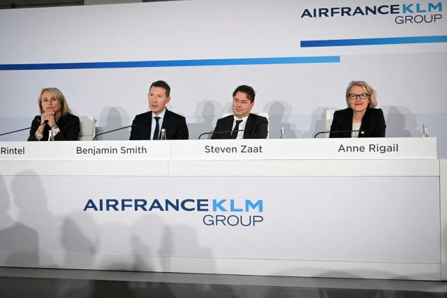 KLM president and Chief Executive Officer Marjan Rintel, Air France KLM general director Benjamin Smith, Air France KLM chief financial officer Steven Zaat, and Chief Executive Officer of Air France Anne Rigail give a press conference to present the annual group's results in Paris on February 19, 2026. Air France-KLM shares soared on February 19, 2026 after the airline posted a full-year net profit of 1.75 billion euros ($2.1 billion), a record for the airline as it focused on premium offerings and benefitted from lower fuel prices. Revenues for the Franco-Dutch carrier rose 4.9 percent to 33 billion euros, also a record, in what it called a "challenging environment", with passenger numbers up five percent to 102.8 million people. (Photo by Bertrand GUAY / AFP)