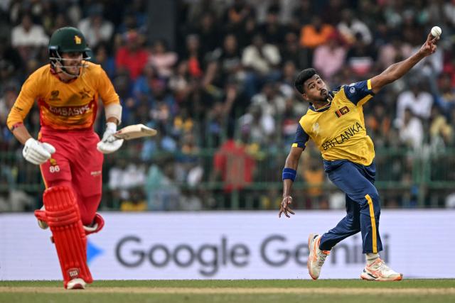 Sri Lanka's Dilshan Madushanka (R) tries to run out Zimbabwe's Brian Bennett (L) during the 2026 ICC Men's T20 Cricket World Cup group stage match between Sri Lanka and Zimbabwe at the R Premadasa Stadium in Colombo on February 19, 2026. (Photo by Ishara S. KODIKARA / AFP)