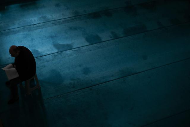 A Muslim devotee reads before offering prayers on the first day of Islamic holy fasting month of Ramadan at a mosque in Pristina on February 19, 2026. (Photo by Armend NIMANI / AFP)