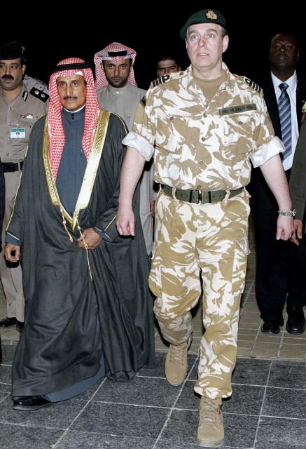 (FILES) Britain's Prince Andrew (R) is greeted by al-Ahmadi city governor Sheikh Ibrahim al-Duaij al-Sabah (L) upon his arrival to the airport in Kuwait City on March 3, 2007. UK police said on February 19, 2026 officers were searching two addresses, one in eastern England and one west of London, following the arrest of ex-Prince Andrew on suspicion of misconduct in a public office. New revelations last week appeared to show Andrew sent convicted sex offender Jeffrey Epstein potentially confidential documents during his time as a UK trade envoy. (Photo by Yasser Al-Zayyat / AFP)
