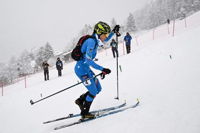 Italy's Giulia Murada competes in the women's sprint ski mountaineering semi-final 1 heat 2 during the Milano Cortina 2026 Winter Olympic Games at the Stelvio Ski Centre in Bormio (Valtellina) on February 19, 2026. (Photo by Fabrice COFFRINI / AFP)