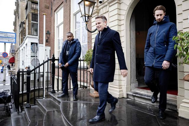 Christian Democratic Appeal (CDA) party Jo-Annes de Bat (C) speaks to the press after a meeting with Netherlands' Prime Minister-designate of the centrist D66 party Rob Jetten at the Johan de Witthuis house in The Hague on February 19, 2026. Jo-Annes de Bat is the designated State Secretary for Climate and Green Growth for the new cabinet. (Photo by Ramon van Flymen / ANP / AFP) / Netherlands OUT