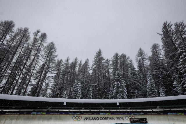 CORRECTION / USA's Elana Meyers Taylor pilots in the bobsleigh women's 2-woman training session heat 5 at Cortina Sliding Centre during the Milano Cortina 2026 Winter Olympic Games in Cortina d'Ampezzo on February 19, 2026. (Photo by FRANCK FIFE / AFP) / “The erroneous mention[s] appearing in the metadata of this photo by FRANCK FIFE has been modified in AFP systems in the following manner: [February 19] instead of [February 18]. Please immediately remove the erroneous mention[s] from all your online services and delete it (them) from your servers. If you have been authorized by AFP to distribute it (them) to third parties, please ensure that the same actions are carried out by them. Failure to promptly comply with these instructions will entail liability on your part for any continued or post notification usage. Therefore we thank you very much for all your attention and prompt action. We are sorry for the inconvenience this notification may cause and remain at your disposal for any further information you may require.”