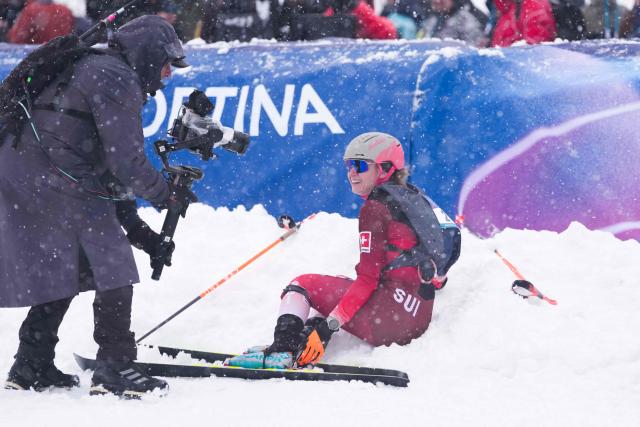 Gold medallist Switzerland's Marianne Fatton celebrates after winning the women's sprint ski mountaineering final during the Milano Cortina 2026 Winter Olympic Games at the Stelvio Ski Centre in Bormio (Valtellina) on February 19, 2026. (Photo by Dimitar DILKOFF / AFP)