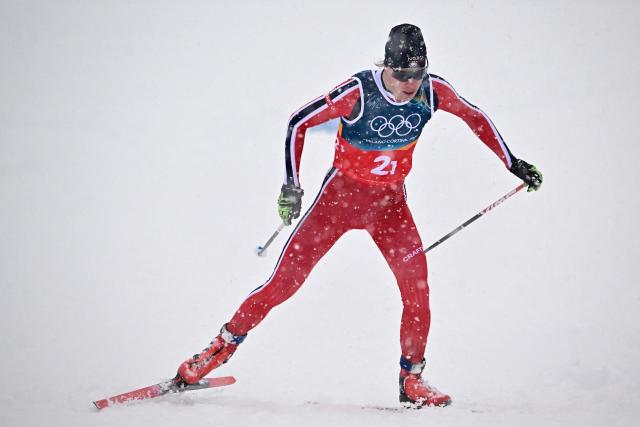 Norway's Andreas Skoglund competes in the cross-country of the nordic combined team sprint large hill event at Tesero Cross Country Stadium at Lago di Tesero (Val di Fiemme) during the Milano Cortina 2026 Winter Olympic Games on February 19, 2026. (Photo by Tobias SCHWARZ / AFP)