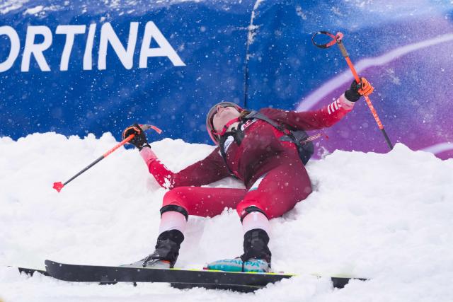 Gold medallist Switzerland's Marianne Fatton celebrates after winning the women's sprint ski mountaineering final during the Milano Cortina 2026 Winter Olympic Games at the Stelvio Ski Centre in Bormio (Valtellina) on February 19, 2026. (Photo by Dimitar DILKOFF / AFP)