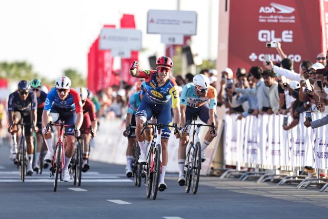 Jonathan Lidl-Trek's Italian rider Jonathan Milan reacts after crossing the finish line first during the fourth stage of the UAE Tour cycling event in al-Fujairah on February 19, 2026. (Photo by Fadel SENNA / AFP)