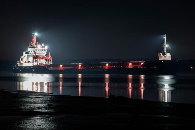 The tanker Baltic Wind is pictured as it ran aground near Hundested, Denmark, on February 19, 2026. The cargo ship ran aground in the evening of February 18, 2026 off Kulhuse between Roskilde Fjord and Isefjord in northern Zealand, and it is still stuck in the sandbank. The ship sails under the Portuguese flag. (Photo by Steven Knap / Ritzau Scanpix / AFP) / Denmark OUT