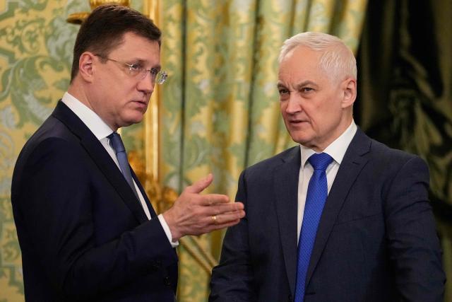 Russian Deputy Prime Minister Alexander Novak speaks with Russian Defen?e Minister Andrei Belousov ahead of a meeting between Russian President and Madagascar's President at the Grand Kremlin Palace in Moscow on February 19, 2026. (Photo by Alexander Zemlianichenko / POOL / AFP)