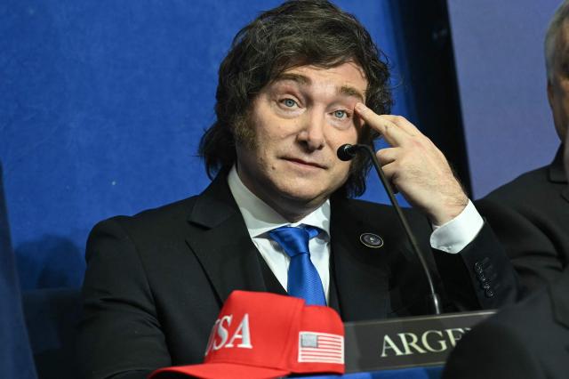 Argentina's President Javier Milei attends the inaugural meeting of the "Board of Peace" hosted by US President Donald Trump at the US Institute of Peace in Washington, DC, on February 19, 2026. President Trump on Thursday gathers allies to inaugurate the "Board of Peace," his new institution focused on progress on Gaza but whose ambitions reach much further. Around two dozen world leaders or other senior officials have come to Washington for the meeting -- including several of Trump's authoritarian-leaning friends and virtually none of the European democrats that traditionally sign on to US initiatives. (Photo by SAUL LOEB / AFP)
