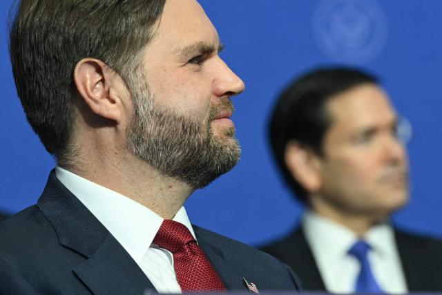(L/R) US Vice President JD Vance and US Secretary of State Marco Rubio attend the inaugural meeting of the "Board of Peace" hosted by US President Donald Trump at the US Institute of Peace in Washington, DC, on February 19, 2026. President Trump on Thursday gathers allies to inaugurate the "Board of Peace," his new institution focused on progress on Gaza but whose ambitions reach much further. Around two dozen world leaders or other senior officials have come to Washington for the meeting -- including several of Trump's authoritarian-leaning friends and virtually none of the European democrats that traditionally sign on to US initiatives. (Photo by SAUL LOEB / AFP)