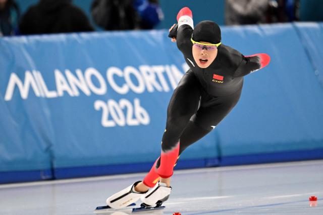 China's Liu Hanbin competes in the speed skating men's 1500m during the Milano Cortina 2026 Winter Olympic Games at Milano Speed Skating Stadium in Milan on February 19, 2026. (Photo by Daniel MUNOZ / AFP)