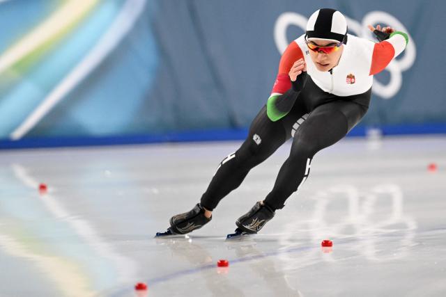 Hungary's Kim Min-seok competes in the speed skating men's 1500m during the Milano Cortina 2026 Winter Olympic Games at Milano Speed Skating Stadium in Milan on February 19, 2026. (Photo by Daniel MUNOZ / AFP)