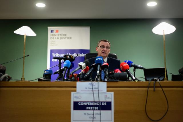 French prosecutor of Lyon Thierry Dran addresses the audience during a press conference, a week after the killing in Lyon of far-right activist Quentin Deranque at Lyon courthouse on February 19, 2026. As all the suspects "deny intent to kill" Thierry Dran informed that the prosecution requests seven suspects to be charged with "voluntary homicide" and the four other suspects have been released. (Photo by OLIVIER CHASSIGNOLE / AFP)