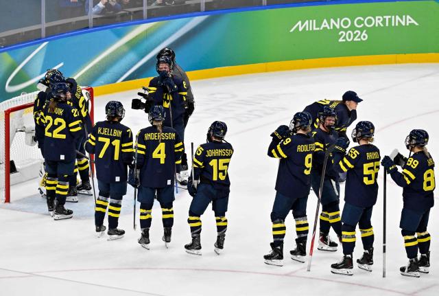 Sweden's players react after losing the women's bronze medal ice hockey match between Switzerland and Sweden at the Milano Santagiulia Ice Hockey Arena during the Milano Cortina 2026 Winter Olympic Games in Milan, on February 19, 2026. (Photo by Alexander NEMENOV / AFP)
