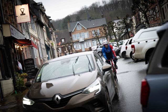 Groupama-FDJ's French cyclist Guillaume Martin-Guyonnet rides during a training session in Blangy-le-Chateau, north-western france on February 19, 2026. French cyclist Guillaume Martin Guyonnet was the best climber in the 2020 Tour of Spain, came third in the Criterium du Dauphine the same year, and finished eighth in the 2021 Tour de France. He is also the author of several books on philosophy and its application to sport. (Photo by Lou BENOIST / AFP)