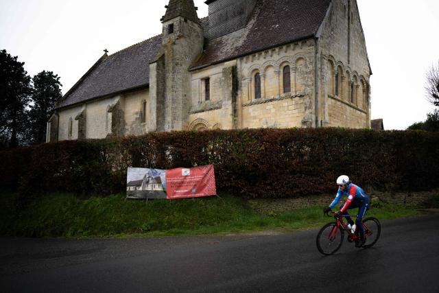 Groupama-FDJ's French cyclist Guillaume Martin-Guyonnet rides during a training session in Putot-en-Auge, north-western france on February 19, 2026. French cyclist Guillaume Martin Guyonnet was the best climber in the 2020 Tour of Spain, came third in the Criterium du Dauphine the same year, and finished eighth in the 2021 Tour de France. He is also the author of several books on philosophy and its application to sport. (Photo by Lou BENOIST / AFP)