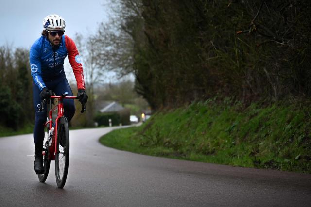 Groupama-FDJ's French cyclist Guillaume Martin-Guyonnet rides during a training session in Putot-en-Auge, north-western france on February 19, 2026. French cyclist Guillaume Martin Guyonnet was the best climber in the 2020 Tour of Spain, came third in the Criterium du Dauphine the same year, and finished eighth in the 2021 Tour de France. He is also the author of several books on philosophy and its application to sport. (Photo by Lou BENOIST / AFP)