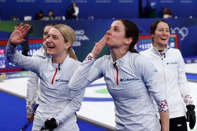 (from L) USA's Cory Thiesse, USA's Tara Peterson and USA's Tabitha Peterson celebrate their victory in the curling women's round robin between Canada and South Korea during the Milano Cortina 2026 Winter Olympic Games at the Cortina Curling Olympic Stadium in Cortina d’Ampezzo on February 19, 2026. (Photo by Odd ANDERSEN / AFP)