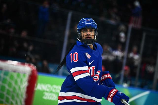 USA's #10 Laila Edwards warms up prior to the women's gold medal ice hockey match between USA and Canada at the Milano Santagiulia Ice Hockey Arena during the Milano Cortina 2026 Winter Olympic Games in Milan, on February 19, 2026. (Photo by JULIEN DE ROSA / AFP)