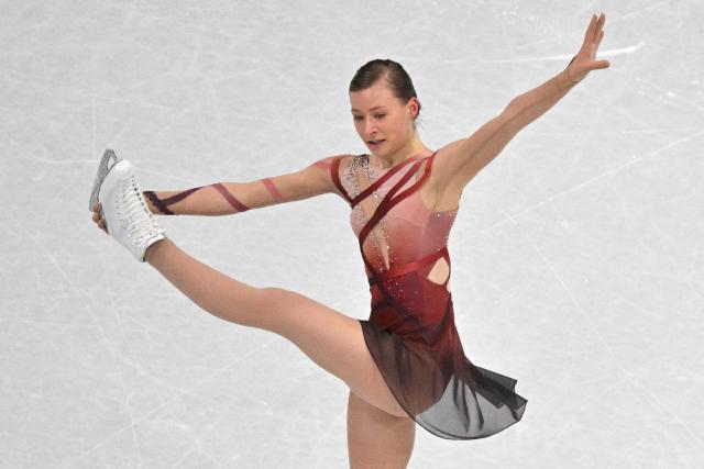 France's Lorine Schild competes in the figure skating women's single free skating final during the Milano Cortina 2026 Winter Olympic Games at Milano Ice Skating Arena in Milan on February 19, 2026. (Photo by Antonin THUILLIER / AFP)