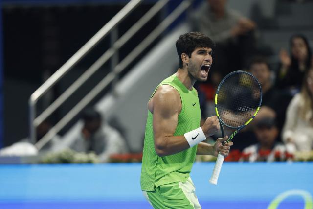 Spain's Carlos Alcaraz reacts during their men’s singles quarterfinal match against Russia's Karen Khachanov at the Qatar Open tennis tournament in Doha on February 19, 2026. (Photo by Karim JAAFAR / AFP)
