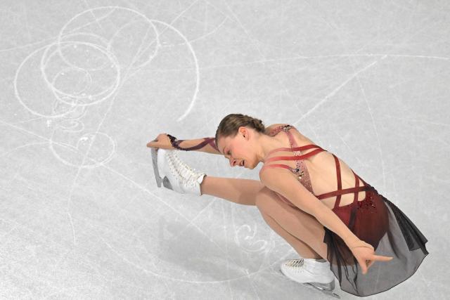 France's Lorine Schild competes in the figure skating women's single free skating final during the Milano Cortina 2026 Winter Olympic Games at Milano Ice Skating Arena in Milan on February 19, 2026. (Photo by Antonin THUILLIER / AFP)