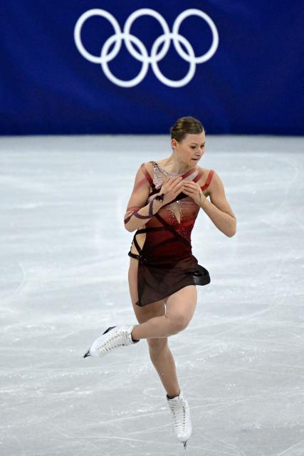 France's Lorine Schild competes in the figure skating women's single free skating final during the Milano Cortina 2026 Winter Olympic Games at Milano Ice Skating Arena in Milan on February 19, 2026. (Photo by WANG Zhao / AFP)
